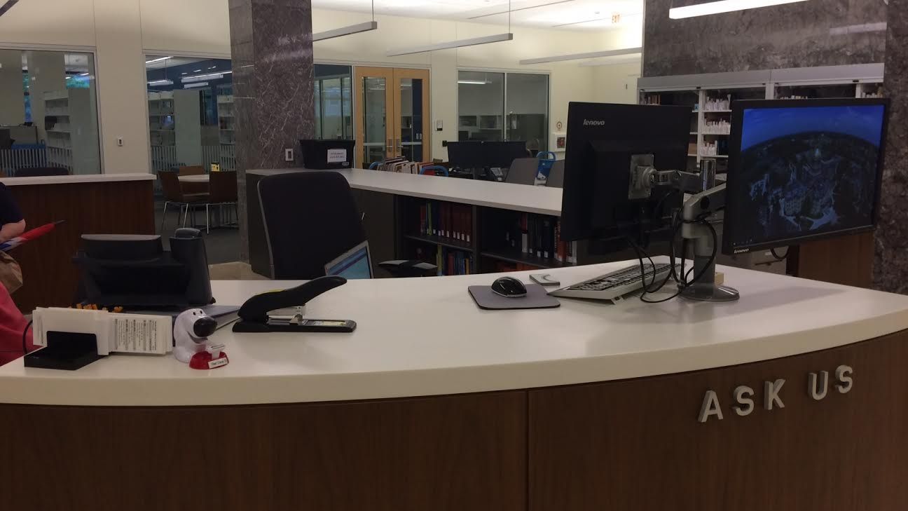 A scene that depicts Ask Us Desk