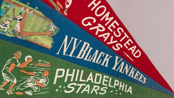 This spotlight exhibit highlights souvenir fan pennants from 1930s and 1940s Negro Leagues baseball teams.