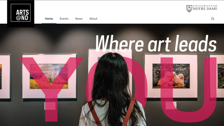 Screenshot of the fromt page of the Arts@ ND website showing a person looking at artwork on a wall